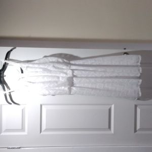 White dress with elastic waistband and full lining size 14/16 by Ashley Stewart.